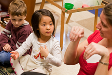 kindergarten students and teacher